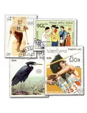 LAOS : pochette de 100 timbres (Oblitérés)